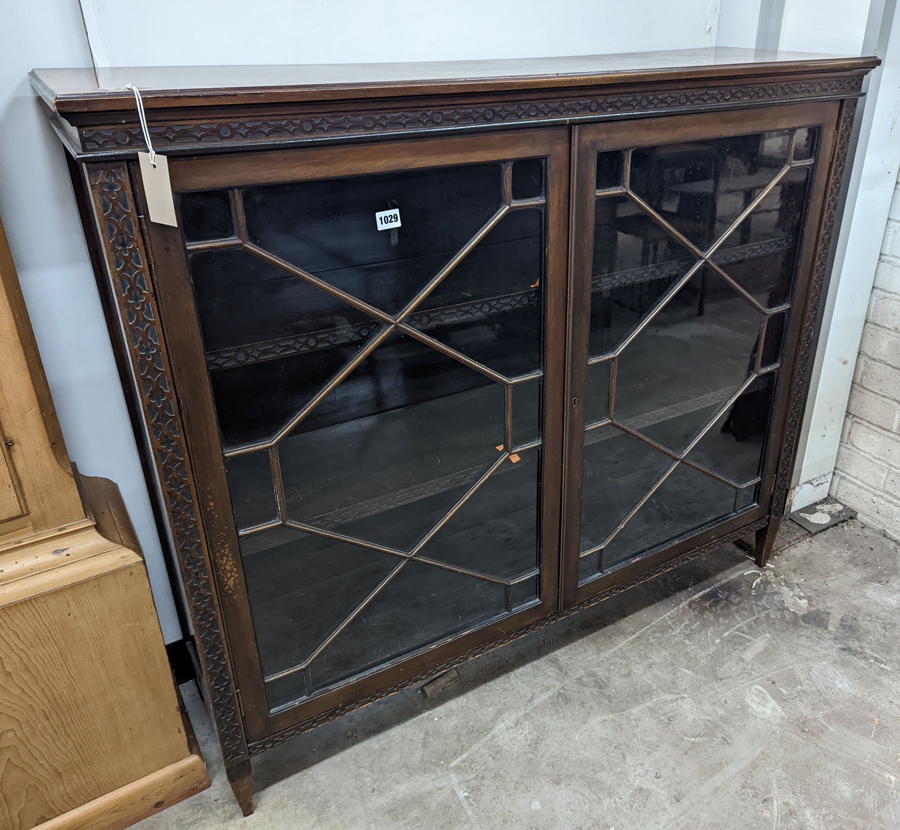 An Edwardian Chippendale revival astragal glazed mahogany bookcase, length 122cm, depth 35cm, height 107cm